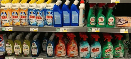Supermarket shelves with cleaning products
